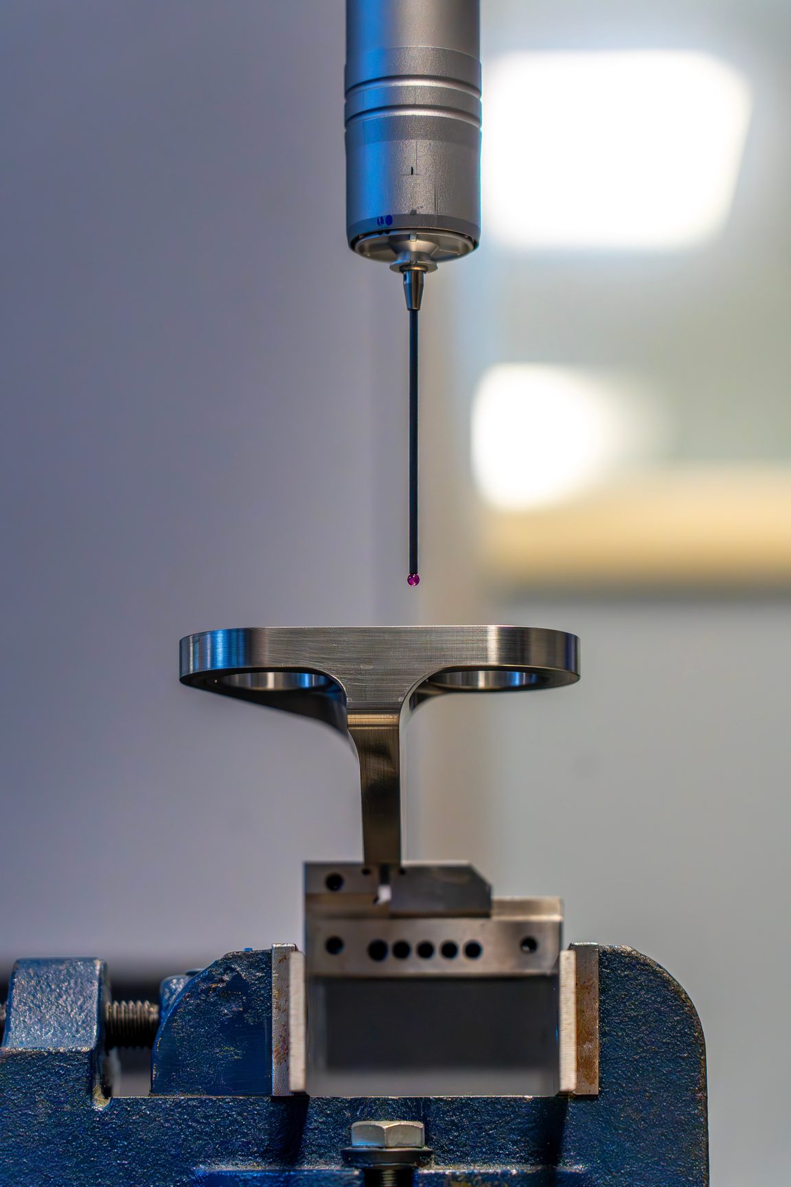 Precision-machined component on an inspection surface