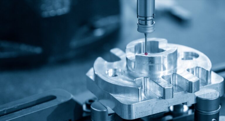 A coordinate measuring machine probe inspecting a precision-machined aluminum component