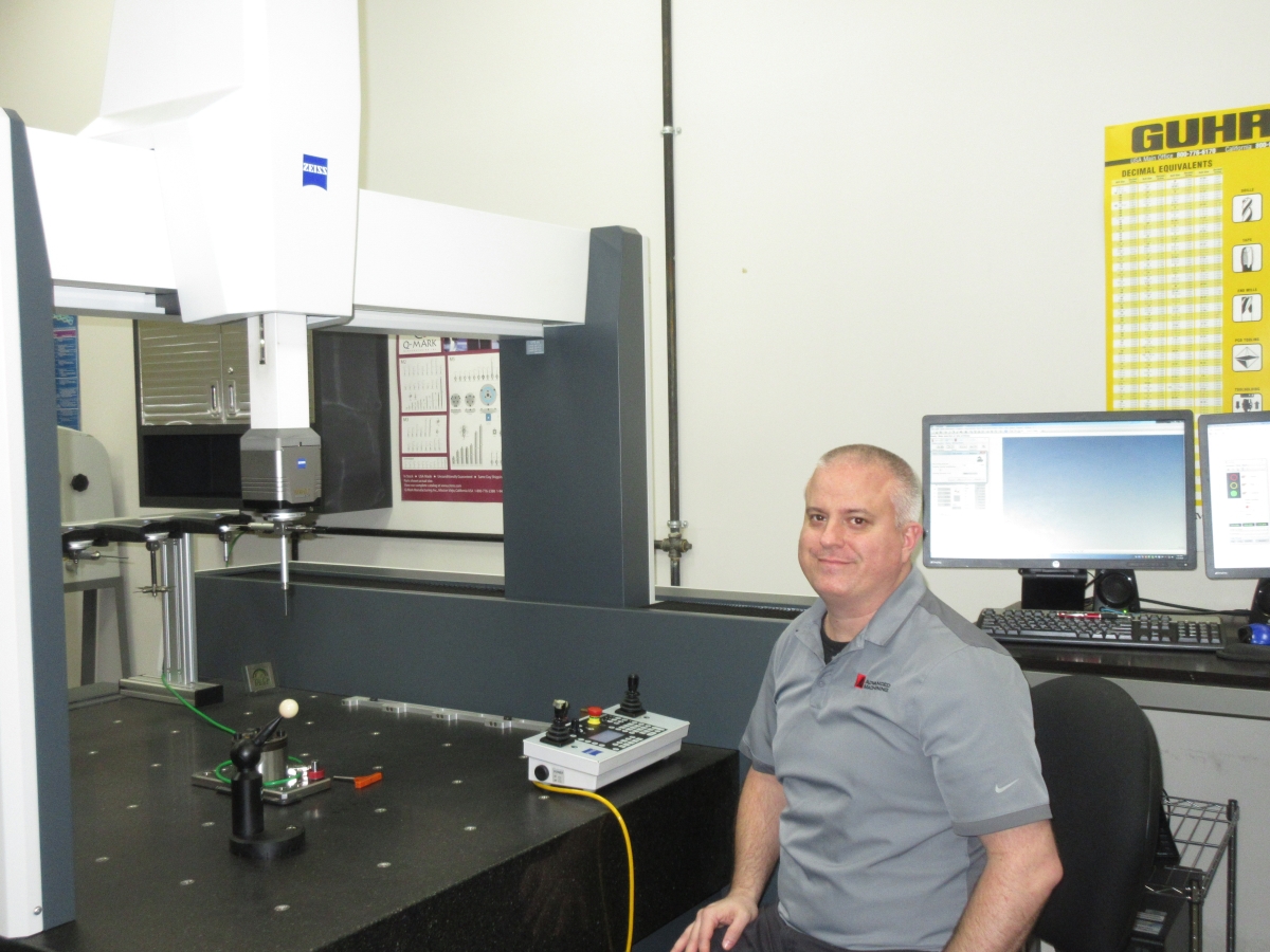 Jeff Geoghan working measurement machine at Advanced Machining